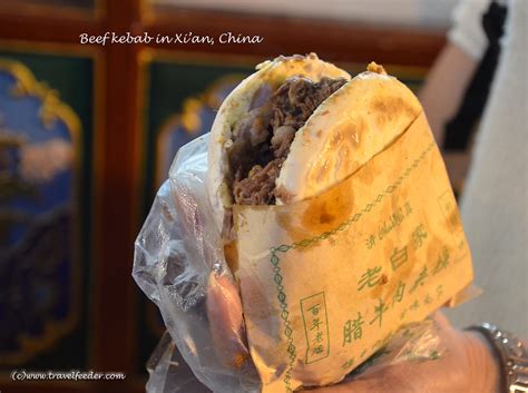  ¡Degusta la Exquisita Complejidad del Rou Jia Mo en Xi'an! Un Manjar de Carne Tierna y Pan Crujiente que te Transportará a las Calles Históricas de China